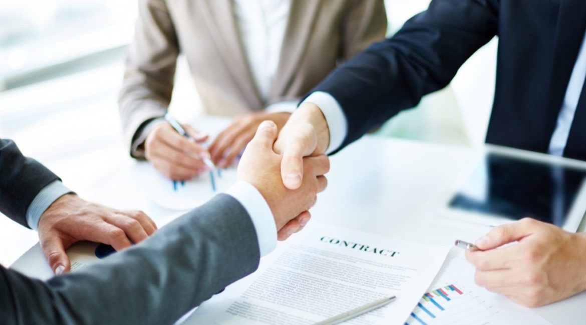 handshake close up executives